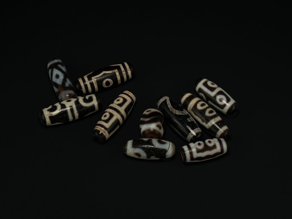 Lot 267: A Collection of Tibetan Dzi Beads. - A...