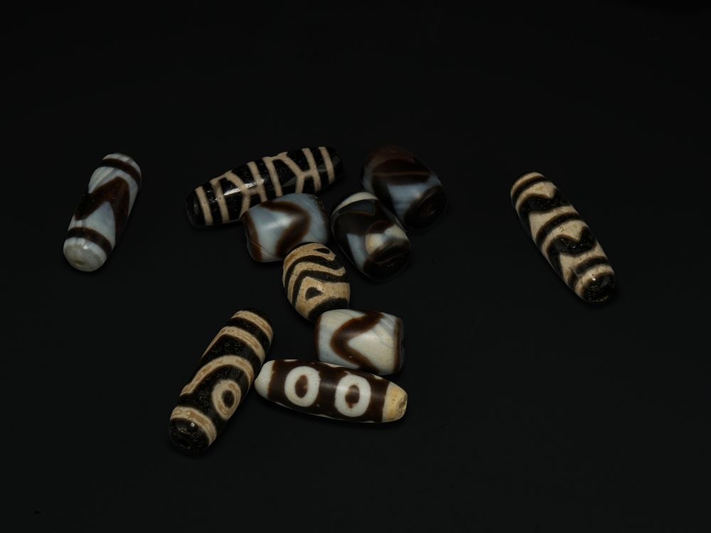 Lot 268: A Collection of Tibetan Dzi Beads. - A...