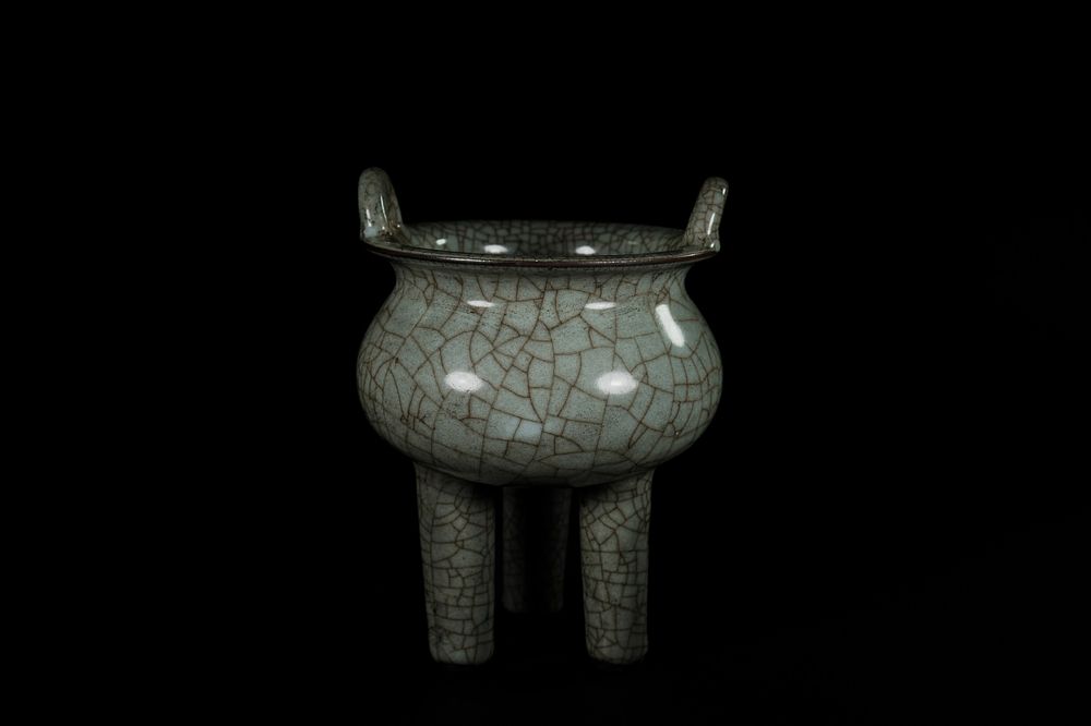 Lot 285: A Chinese Guan Type Celadon-Glazed Tripod Censer -