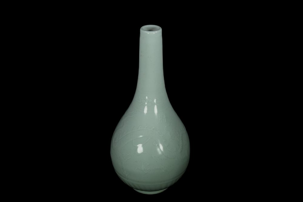 Lot 292: A Chinese Celadon-Glazed Porcelain Bottle Vase -