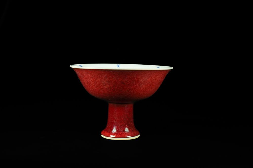 Lot 296: A Chinese Sang de Boeuf Glazed Porcelain Stem...