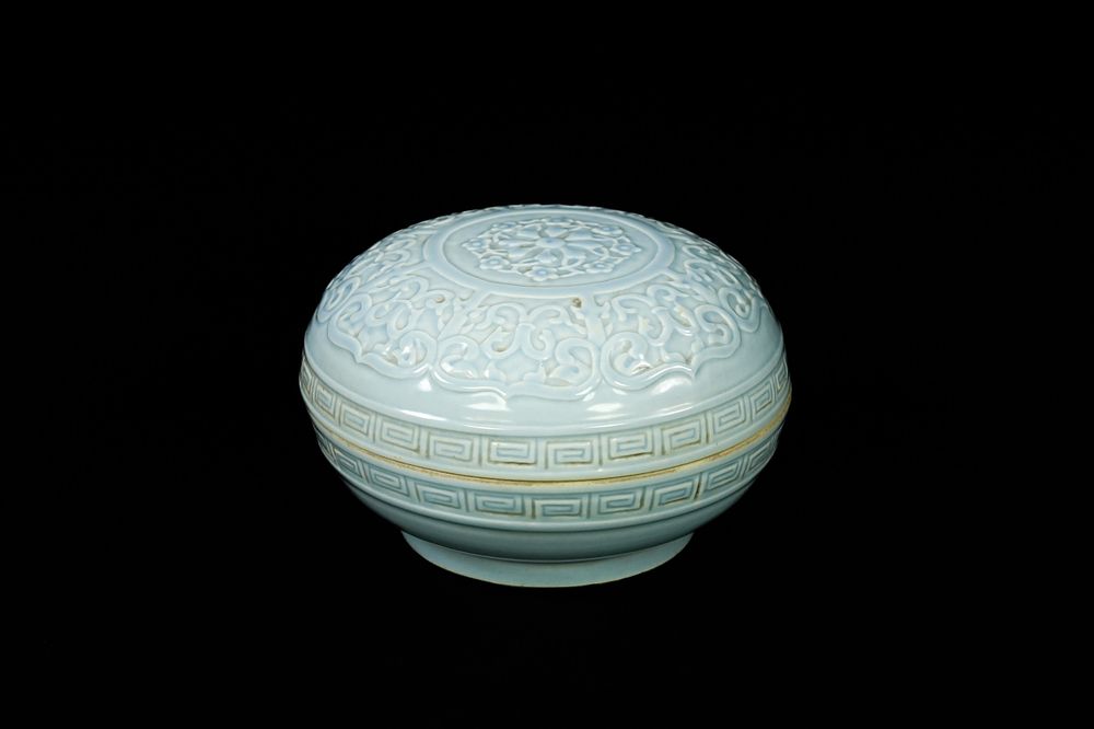 Lot 301: A Chinese Celadon-Glazed Covered Box, Qianlong Mark -