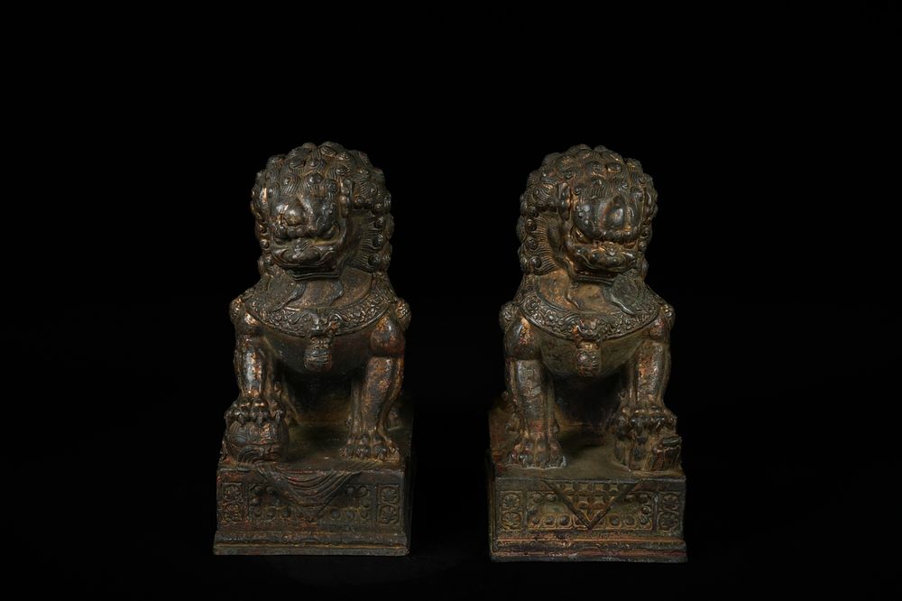 Lot 323: A Pair of Chinese Cast Bronze Foo Dogs,...
