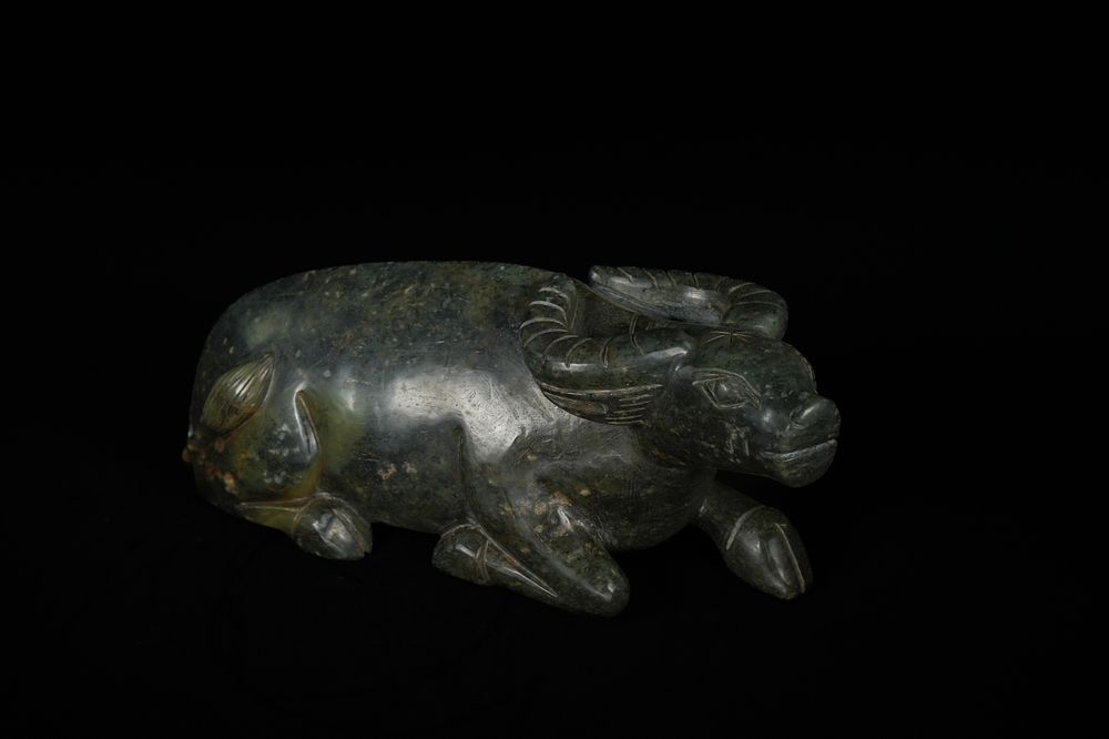 Lot 324: A Large Chinese Spinach Green Jade Water Buffalo...