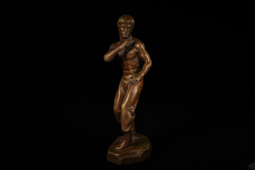 Lot 327: A Bronze Sculpture of Bruce Lee, Attributed to...