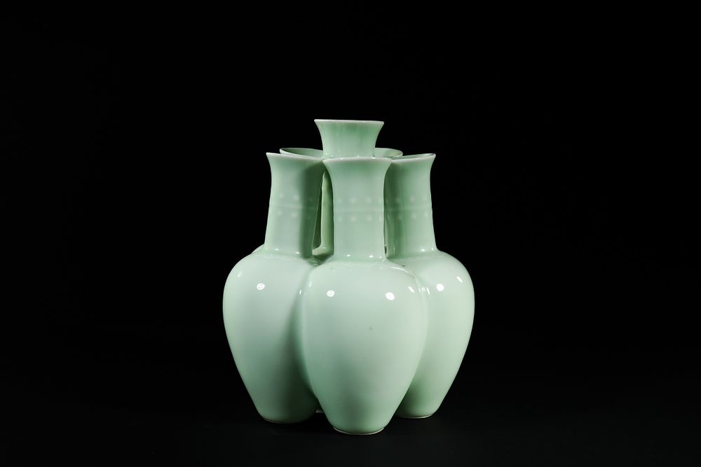 Lot 329: A Chinese Celadon-Glazed Six-Neck Vase, Qianlong Mark.