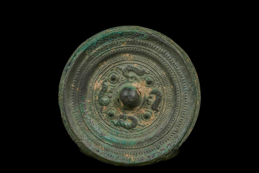 Lot 334: A Chinese Bronze Mirror Decorated with Triangular Rim,...