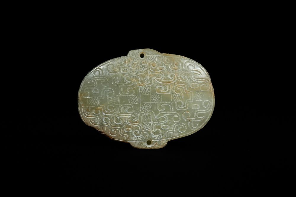 Lot 339: A Chinese Archaic Style Hetian Jade Plaque with...