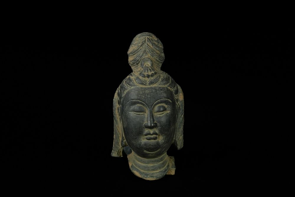 Lot 343: An Chinese Painted Terracotta Buddha Head. -
