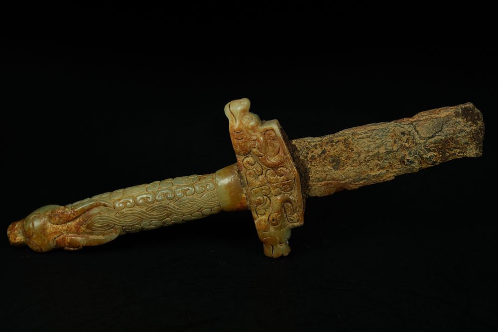 Lot 348: A Chinese Jade Ritual Sword with Carved Zoomorphic...