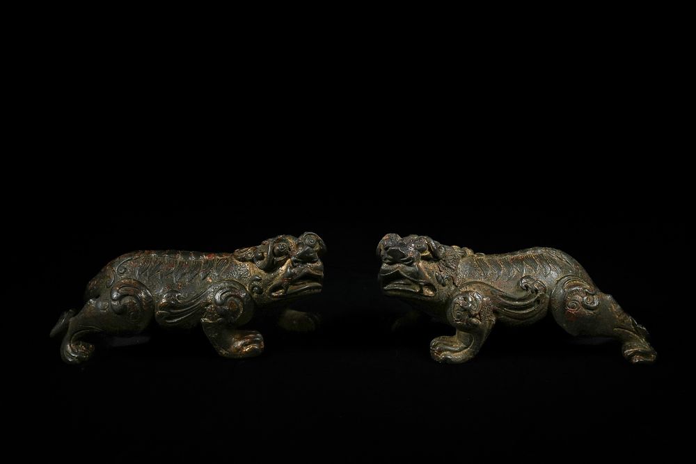 Lot 353: A Pair of Chinese Bronze Qilin Figures, 19th-20th...