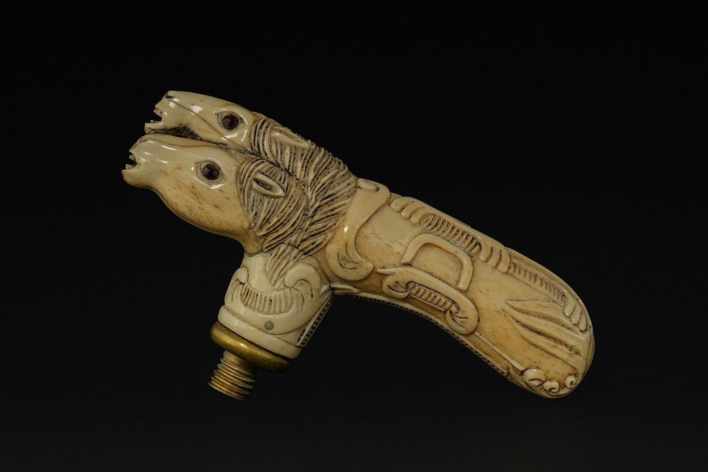 Lot 364: A Chinese Export Carved Bone Horse Head Cane...