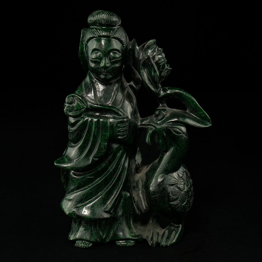 Lot 369: A Chinese Carved Spinach Jade Figure of a...