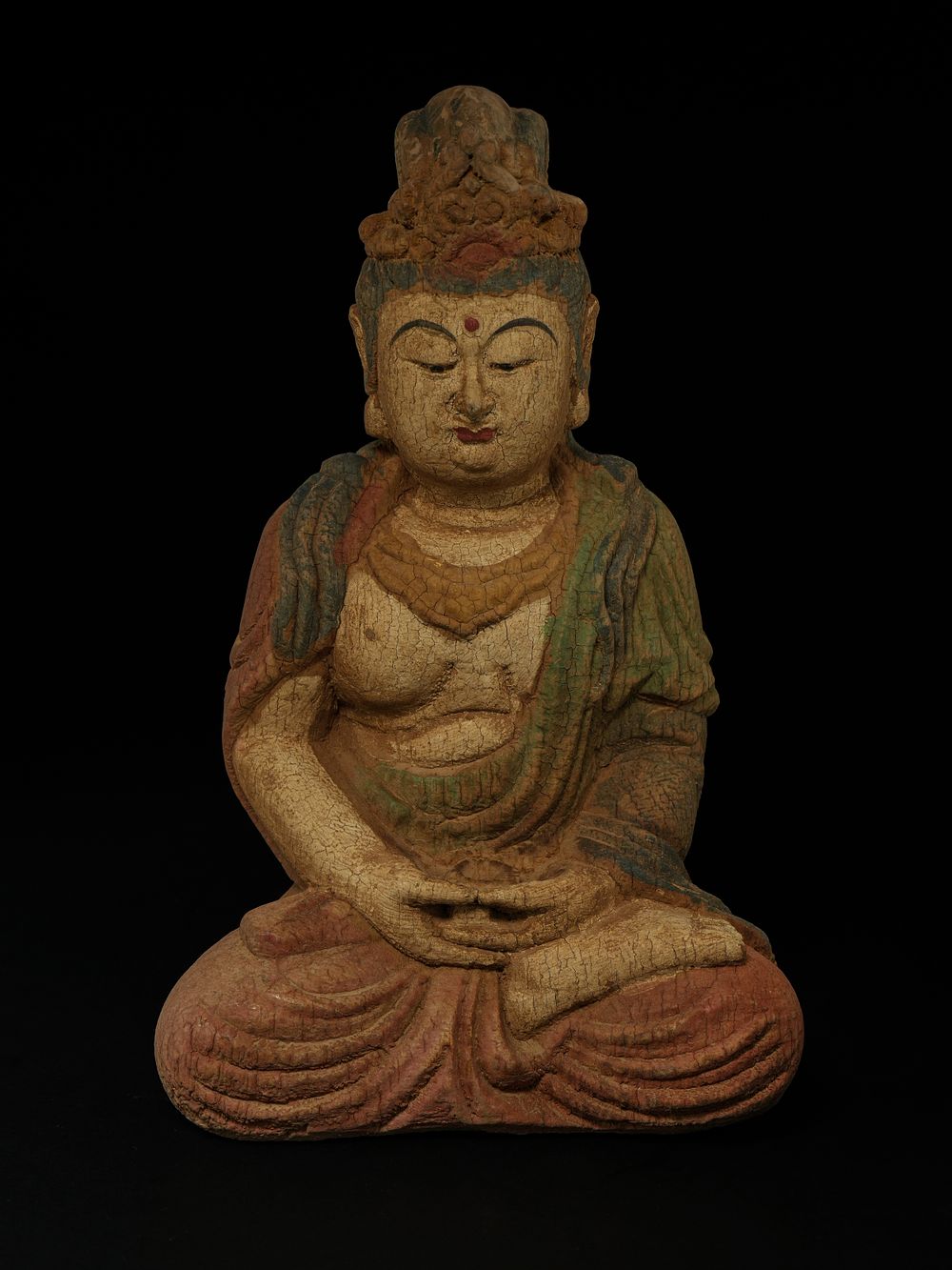 Lot 376: A Chinese Polychrome Seated Bodhisattva Figure.