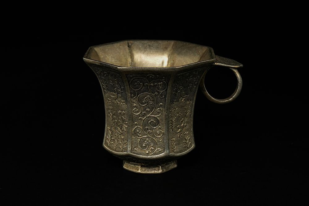 Lot 381: A Chinese Faceted White Metal Cup with Ring...