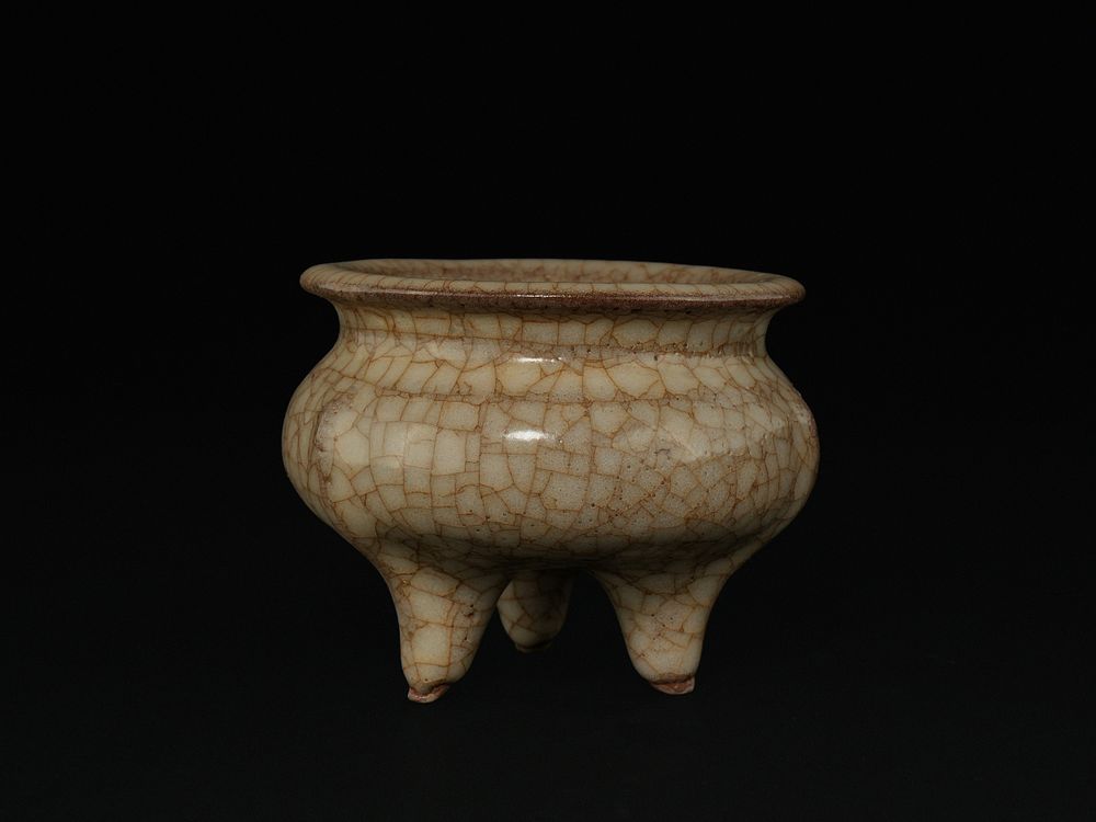 Lot 387: A Chinese Crackle-Glazed Tripod Censer in the Archaic...