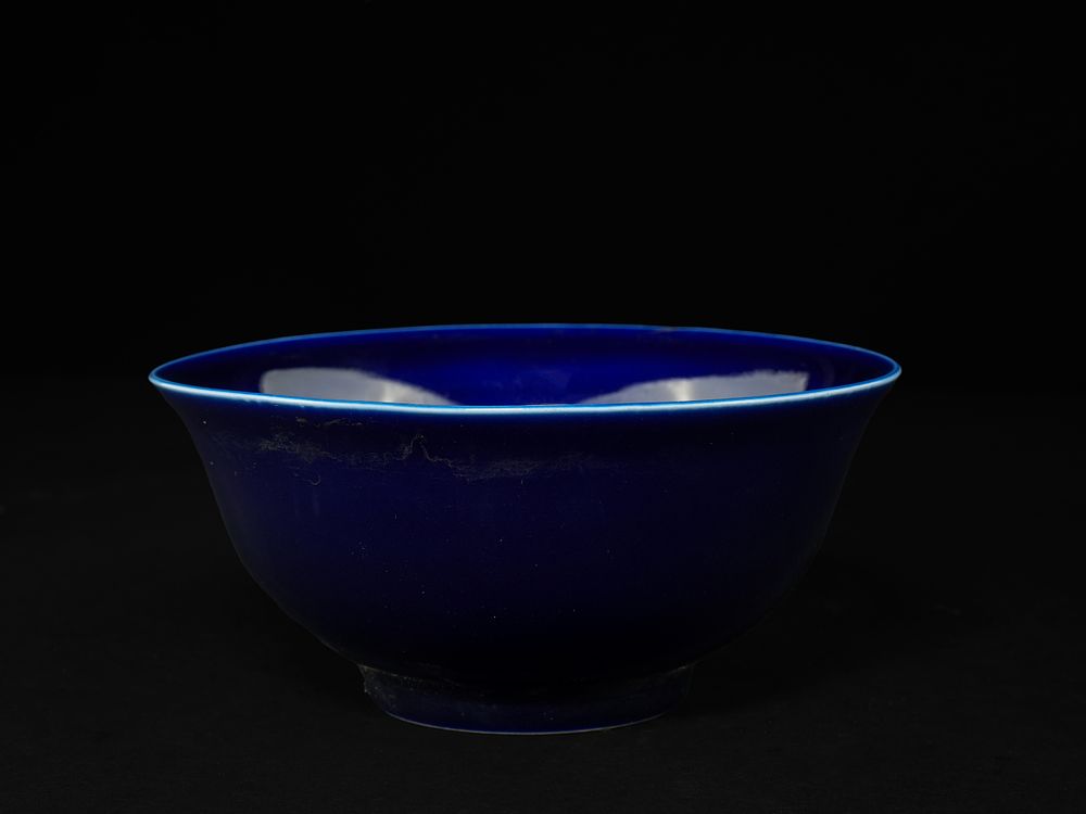 Lot 388: A Chinese Cobalt-Blue Glazed Porcelain Bowl, Qianlong Mark.