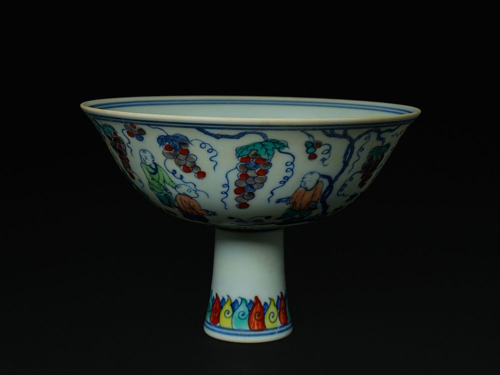 Lot 396: A Chinese Doucai-Style Porcelain Stem Bowl with Boys...