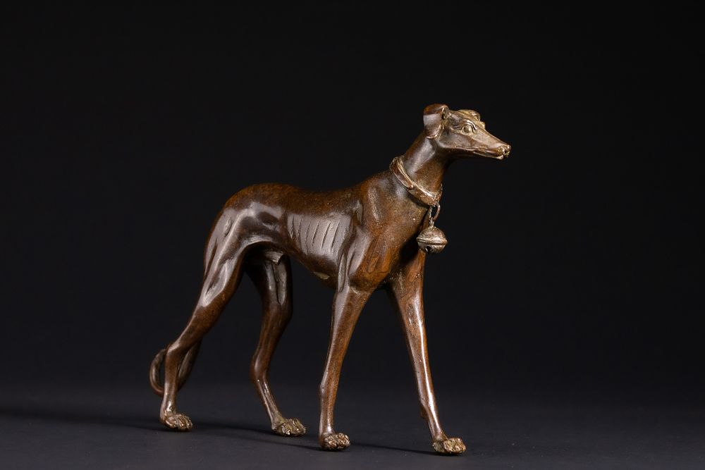 Lot 418: A Japanese Bronze Figure of a Greyhound with...