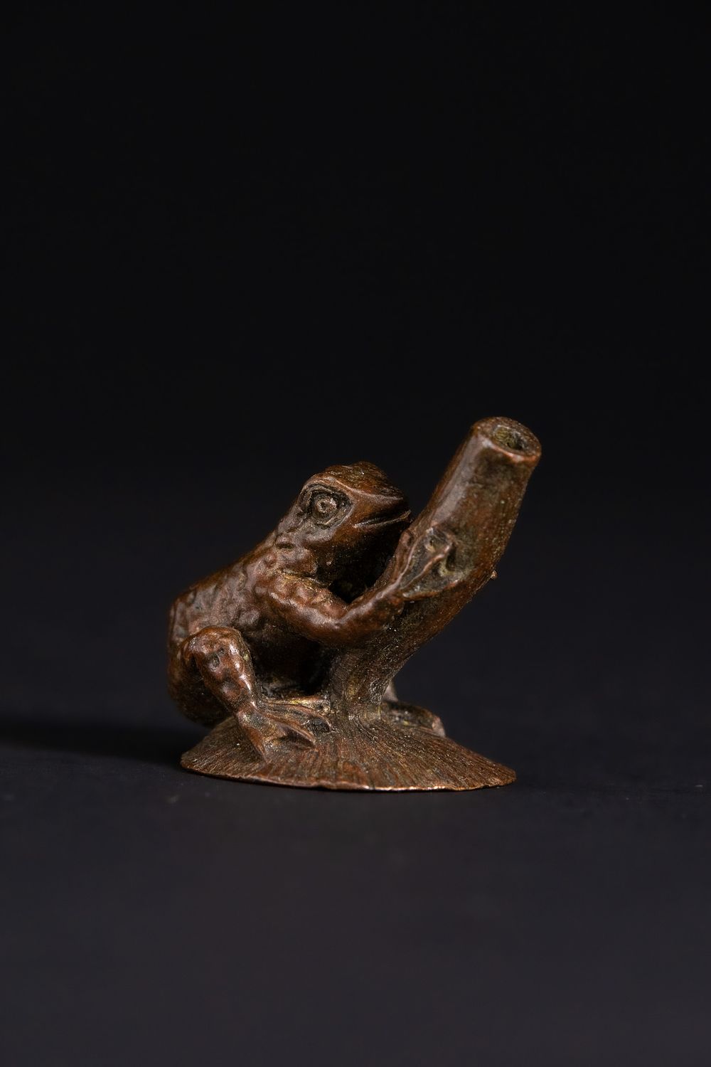 Lot 423: A Japanese Bronze Model of a Frog Climbing...