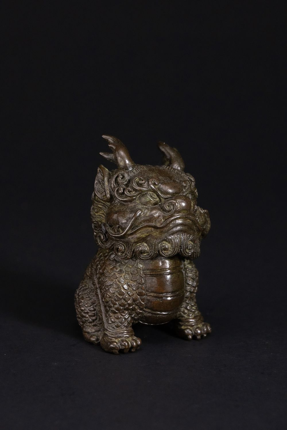 Lot 431: A Japanese Bronze Model of a Komainu (Shishi).