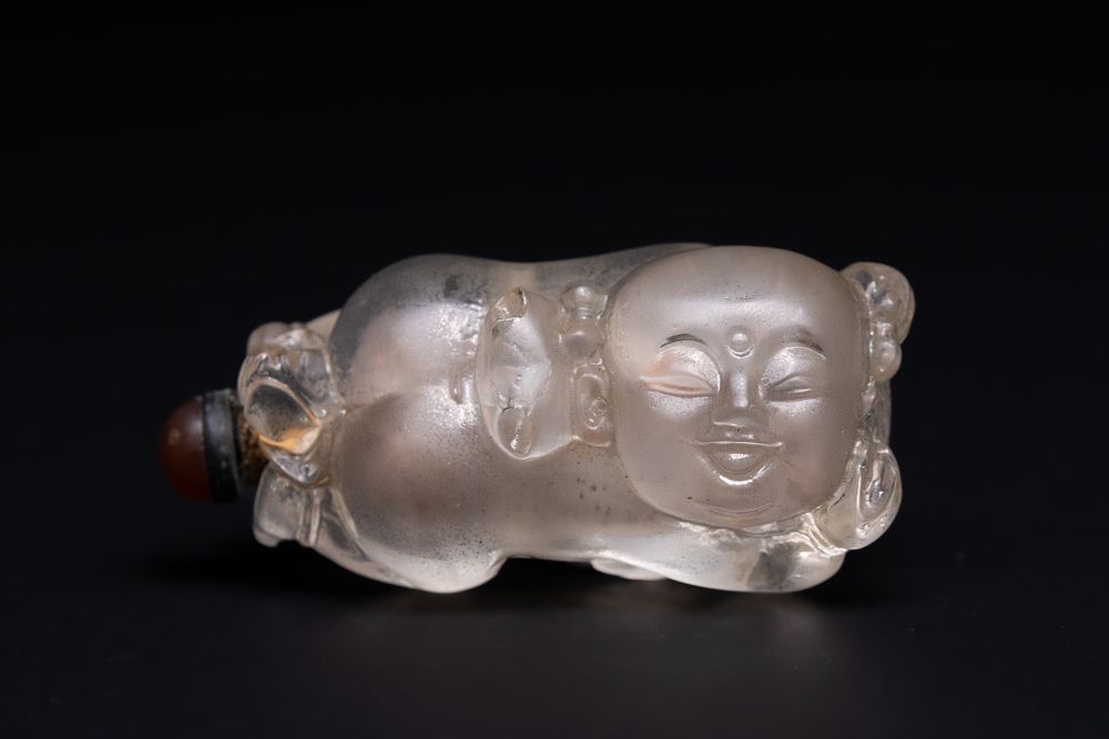 Lot 205: A Chinese Carved Glass Snuff Bottle in the...
