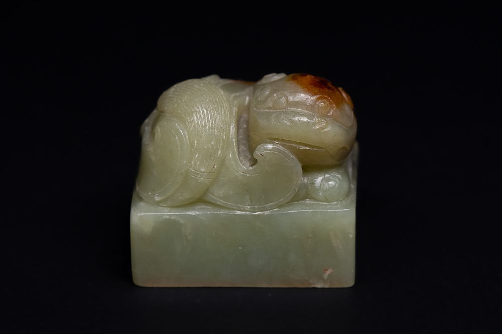 Lot 207: A Chinese Jade Seal Surmounted by a Recumbent...