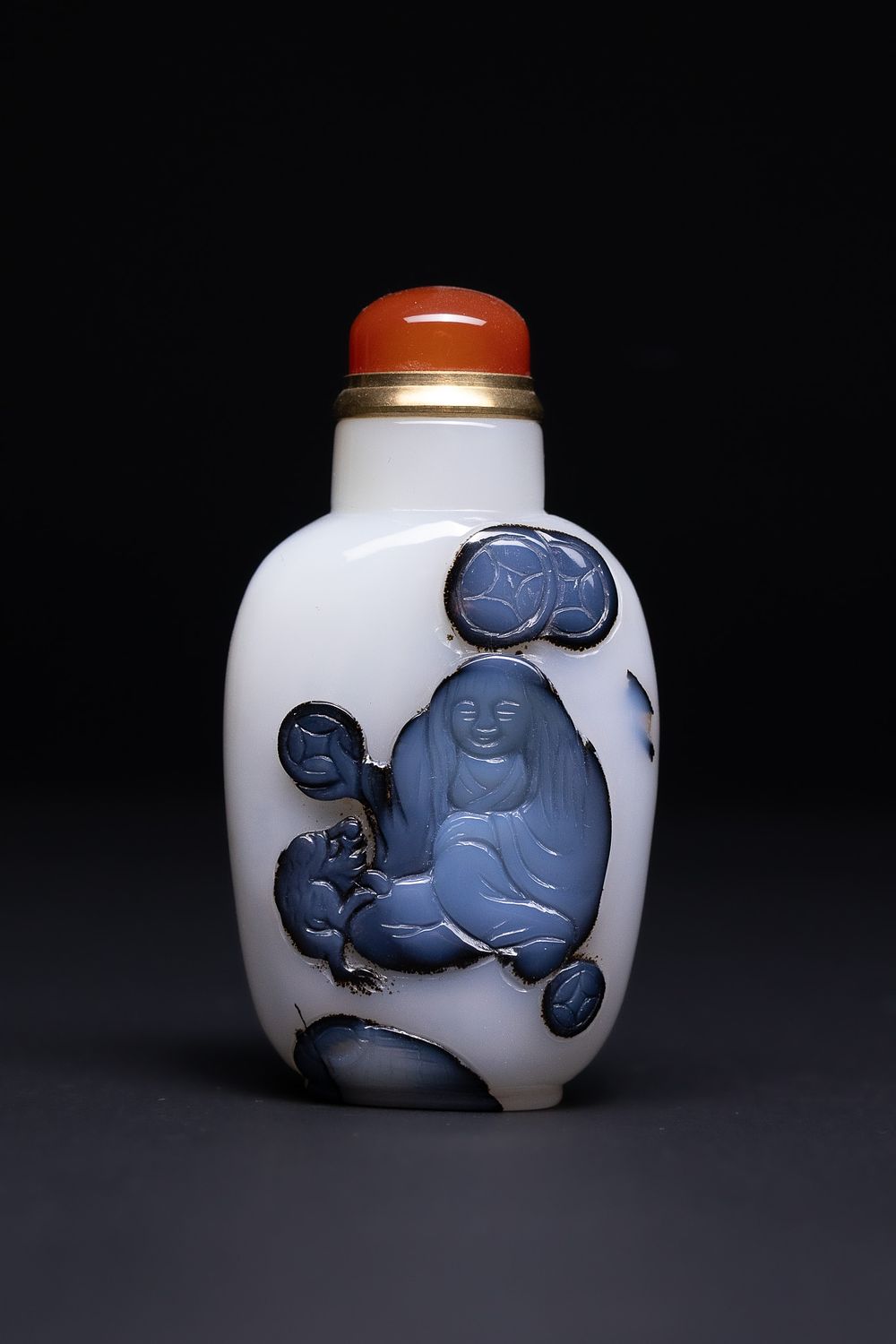 Lot 214: A Chinese White and Blue Agate Snuff Bottle...