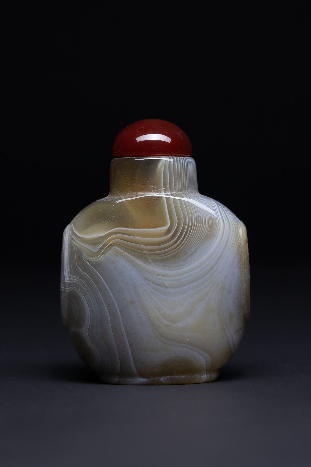 Lot 215: A Chinese Agate Snuff Bottle with Natural Banding...
