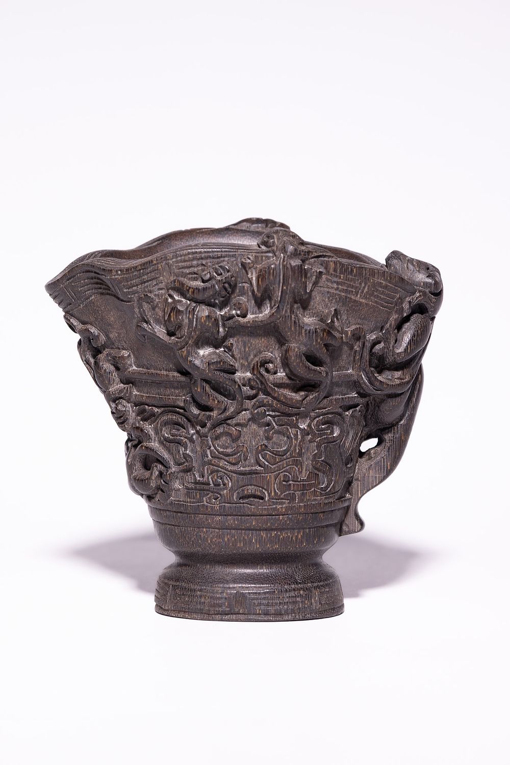 Lot 230: A Chinese Libation Cup with High-Relief Mythical Beast...