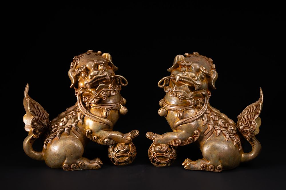 Lot 236: A Pair of Chinese Gilt Bronze Guardian Lion...