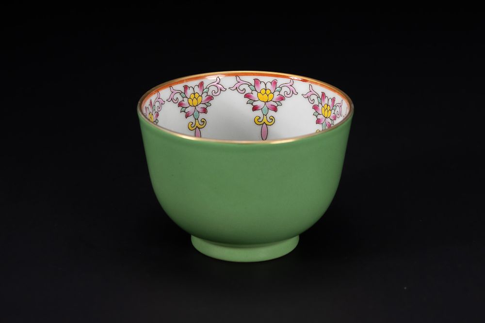 Lot 242: A Chinese Green-Ground Famille Rose Bowl with Floral...