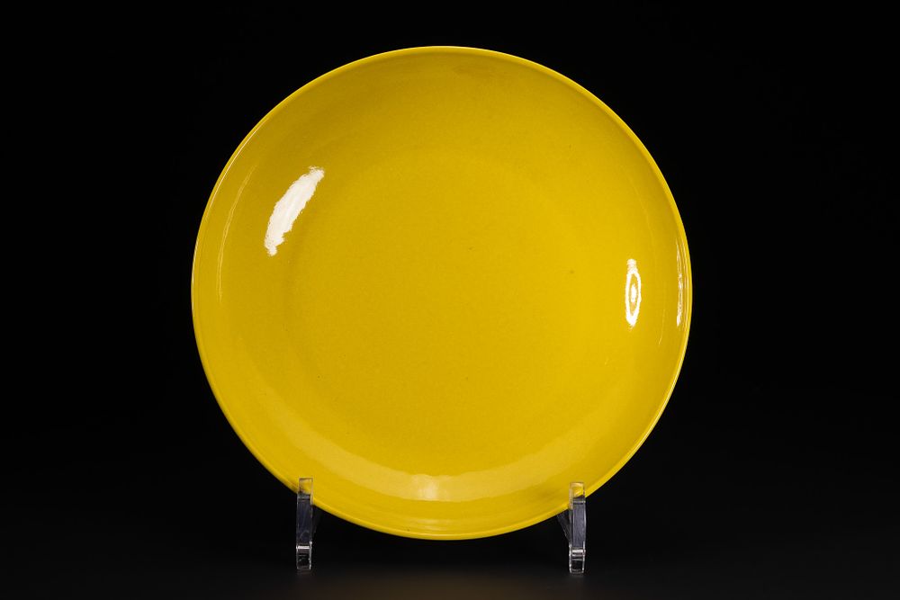 Lot 247: A Chinese Yellow-Glazed Porcelain Dish, Yongzheng Mark.