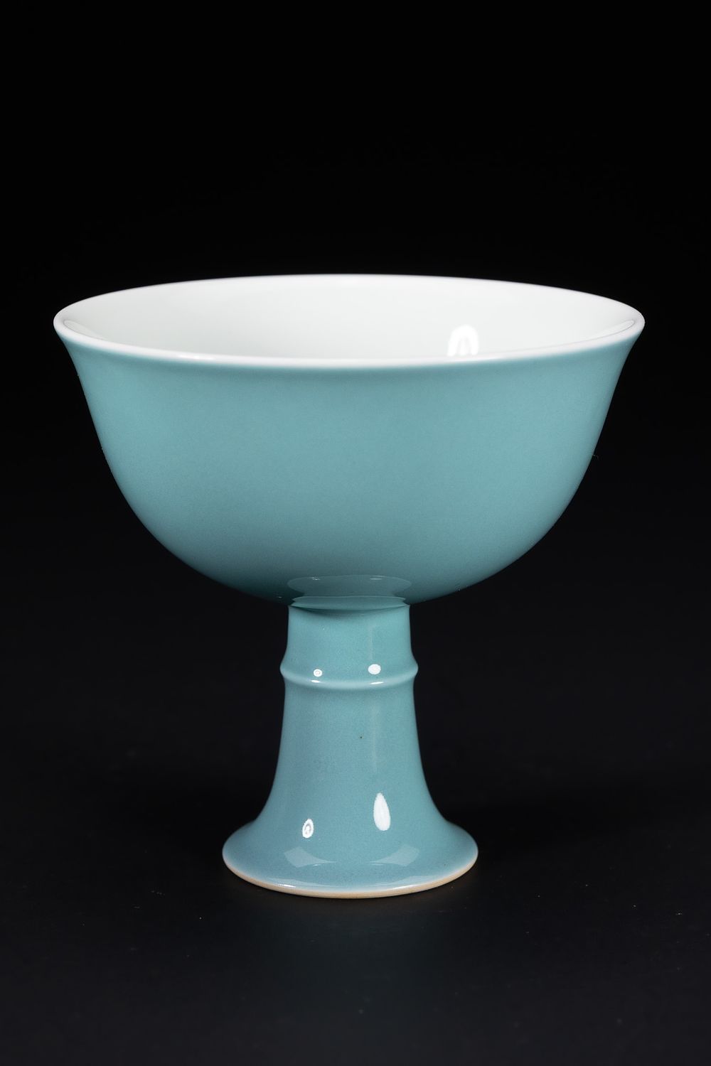 Lot 251: A Chinese Turquoise-Glazed Stem Cup with White Interior...