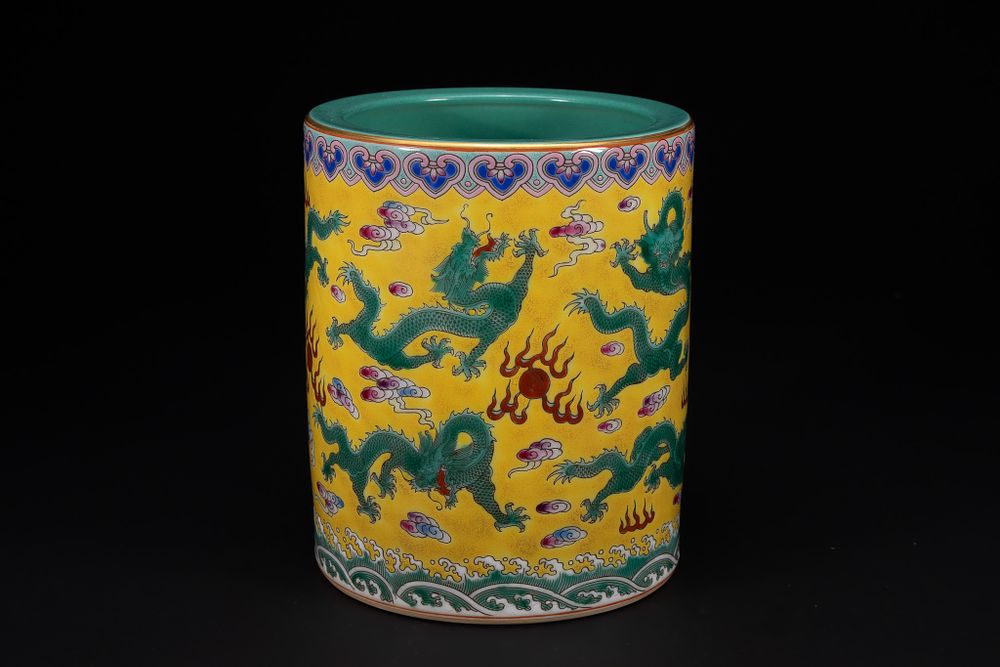 Lot 262: A Chinese Yellow-Ground Famille Rose ‘Dragon’ Brush Pot.