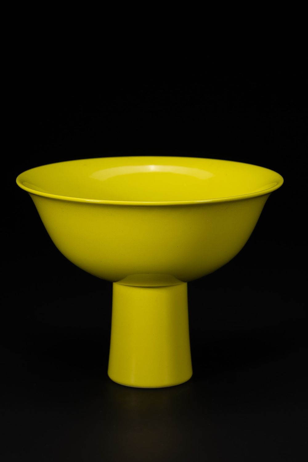 Lot 273: A Chinese Yellow-Glazed Stem Bowl with Flared Rim.