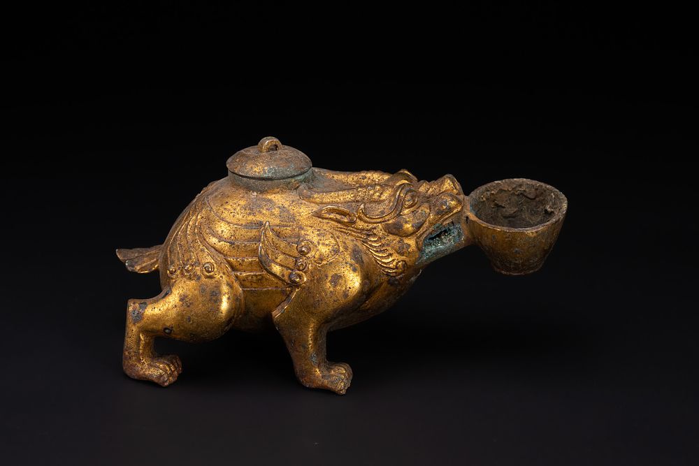 Lot 285: A Chinese Gilt-Bronze Zoomorphic Censor in the Form...