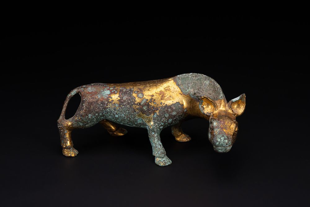 Lot 286: A Chinese Han Style Gilt-Bronze Model of an...