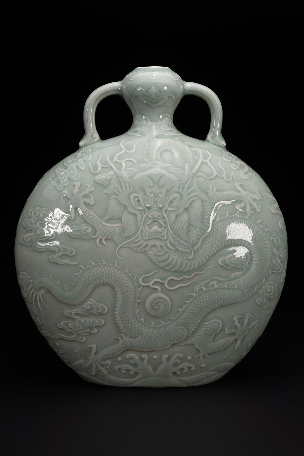 Lot 293: A Chinese Celadon-Glazed ‘Dragon’ Moon Flask, Qianlong Mark.