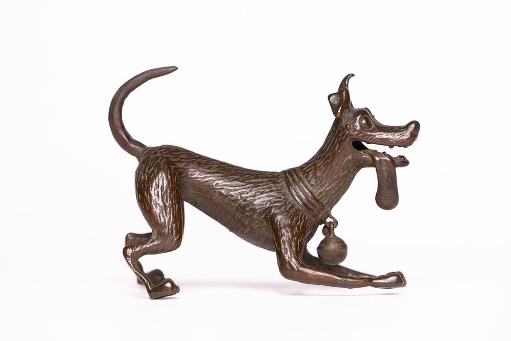 Lot 319: A Japanese Bronze Model of a Dog with...
