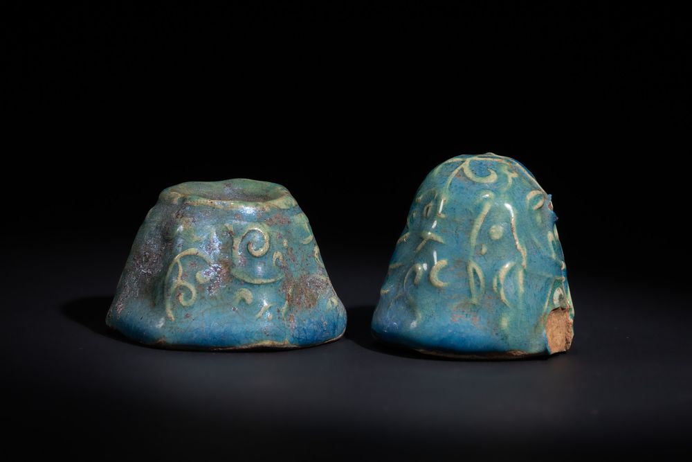 Lot 11: A PAIR OF TURQUOISE-GLAZED CERAMIC CHESS PIECES, POSSIBLY FATIMID 12TH CENTURY.