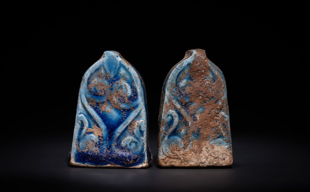 Lot 12: A PAIR OF TURQUOISE-GLAZED CERAMIC CHESS PIECES, POSSIBLY FATIMID 12TH CENTURY.