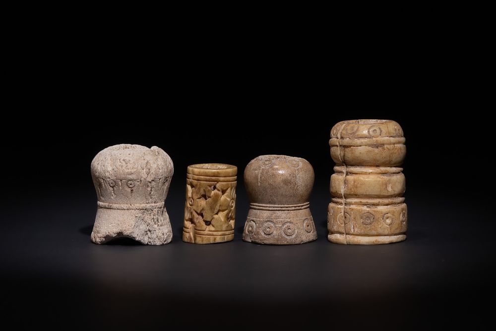 Lot 16: A GROUP OF ISLAMIC BONE GAMING PIECES, POSSIBLY 10TH–13TH CENTURY.