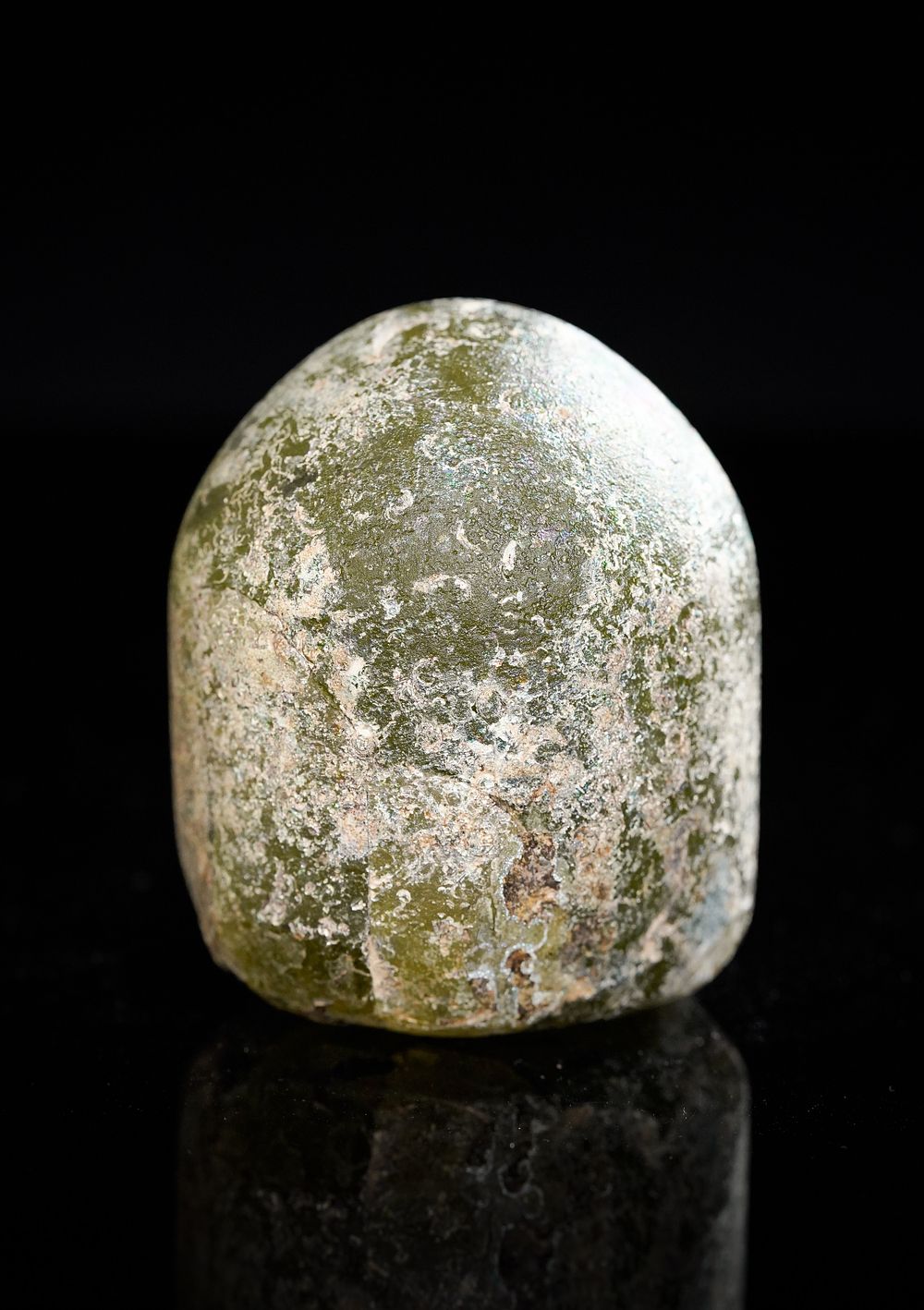 Lot 22: A LARGE ISLAMIC GLASS PAWN CHESS PIECE , 12TH CENTURY.