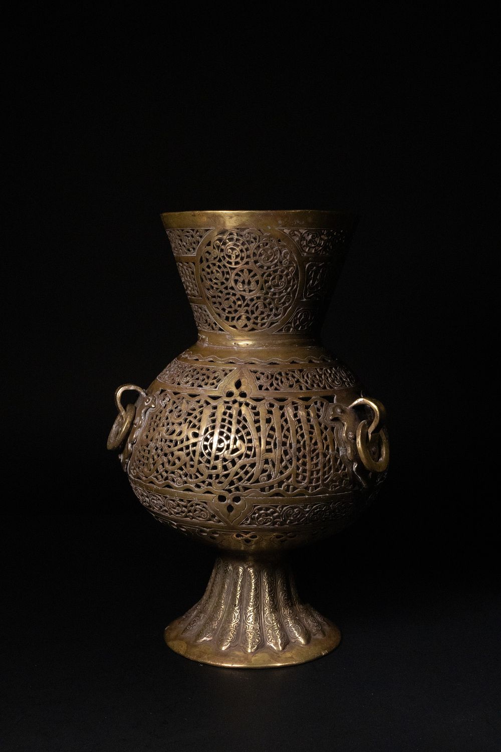 Lot 96: AN OTTOMAN PIERCED BRASS MOSQUE LAMP, 19TH CENTURY.