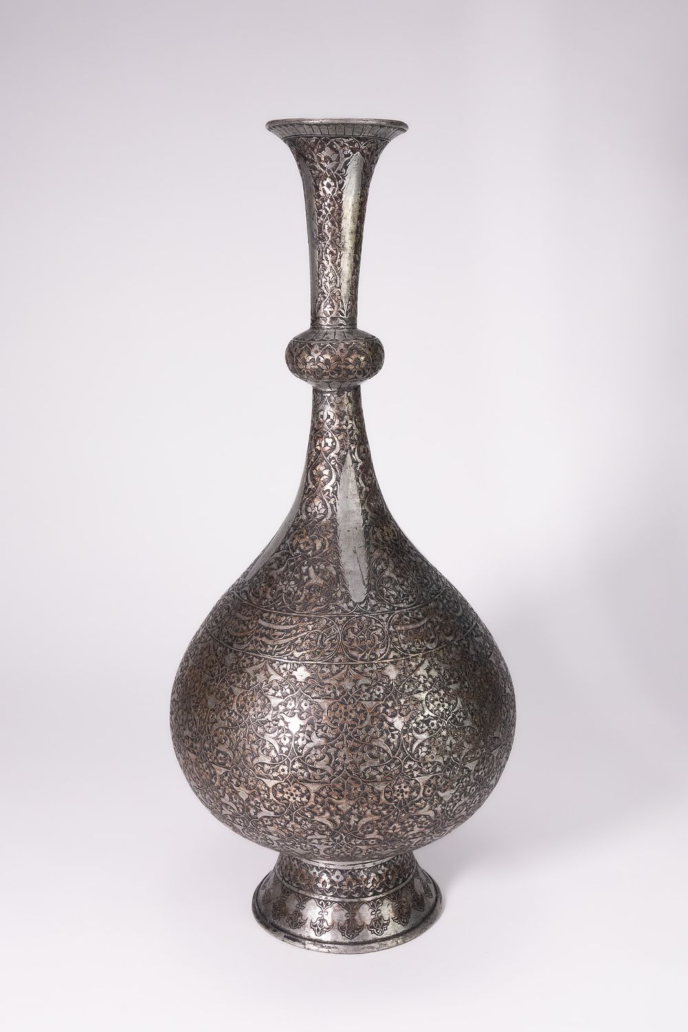 Lot 98: A SAFAVID TINNED COPPER SURAHI OR WATER FLASK, PERSIA, 17TH CENTURY.