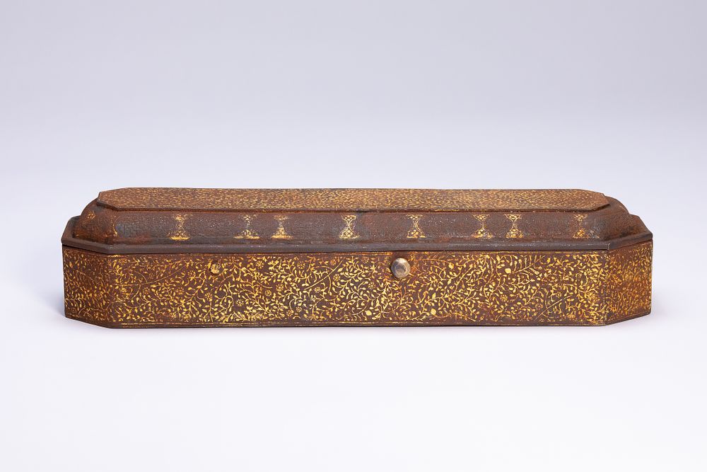 Lot 99: AN INDO-PERSIAN GOLD-INLAID STEEL QALAMDAN.