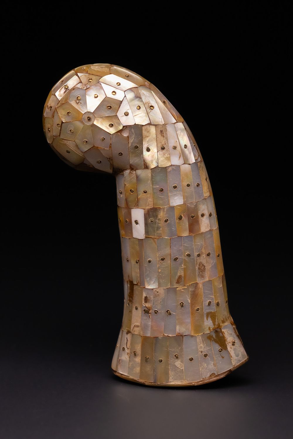 Lot 120: AN OTTOMAN MOTHER-OF-PEARL INLAID DAGGER HILT.