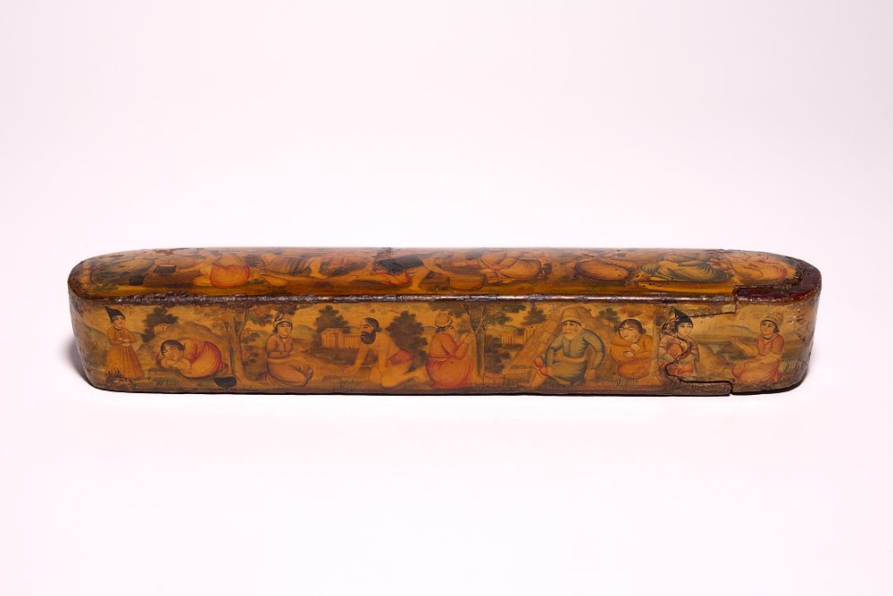 Lot 130: A PERSIAN QAJAR LACQUERED PAPIER-MÂCHÉ PEN BOX QALAMDAN, 19TH CENTURY.