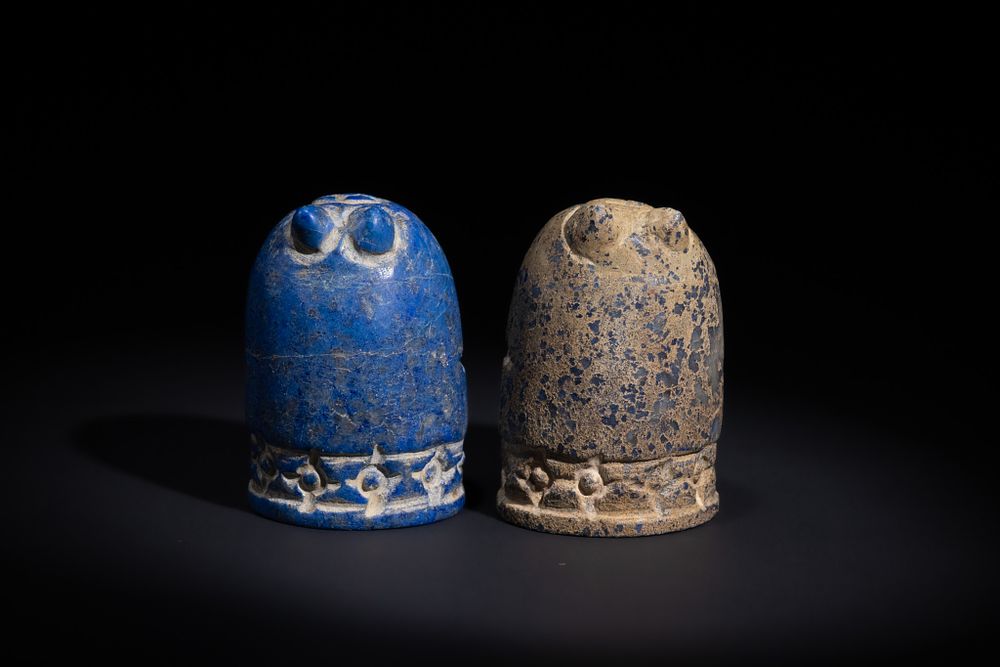 Lot 147: A PAIR OF ISLAMIC CARVED LAPIS LAZULI CHESS PIECES, 20TH CENTURY.